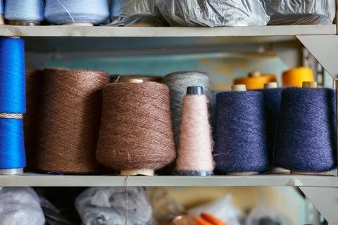 Bobbins with knitted threads Stock Photos