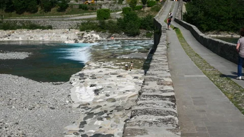 Bobbio, View of the river "Trebbia" and the bridge "Gobbo" ( hunchbacked) Stock Footage 134557840