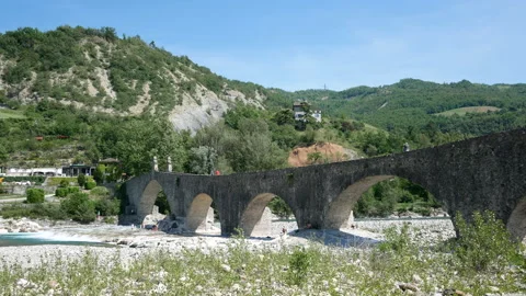 Bobbio, View of the river "Trebbia" and the bridge "Gobbo" (hunchbacked) Stock Footage 134558447