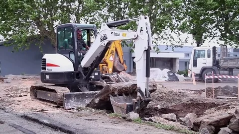 Bobcat Skid Steer Loader working Construction site Stock Footage 71322220