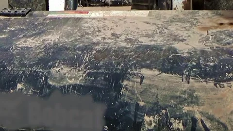 Bobcat sweeper cleaning a road surface on a construction site. Close-up on th Vídeo Stock 301780125