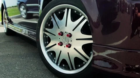 Bobruisk, Belarus 16.05.26: Close-up shot of custom car wheel with shiny Stock Footage 339864448