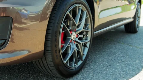 Bobruisk, Belarus 16.05.26: Close up view of luxury car front wheel, featuring Stock Footage 339864538