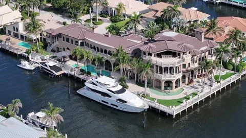 Boca Raton Homes with docks Intercoastal Waterfront Sunny Bridge Trees Stock Footage 276391976