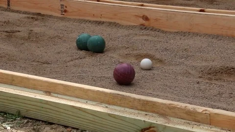Bocce Balls on sand Stock Footage 83466181