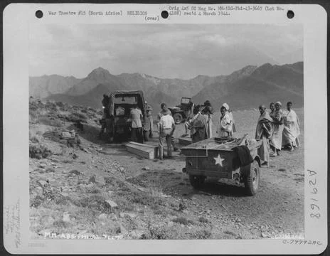Bodes of the Air Force dead are shown being loaded on a truck for transpor... Фото