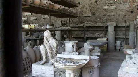 Bodies and household objects mummified Pompeii Stock-Footage 34086901
