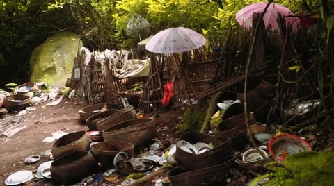 Bodies in bamboo cages and things that belong to the dead - Trunyan Cemetery 動画素材 65249758