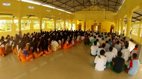 Bodo tribe during prayer view from the back in the temple of the five elements i Stock Footage 113289013