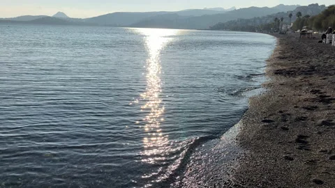 Bodrum Turkey Waves Lapping On A Beach At Sunset Stock Footage 235208150