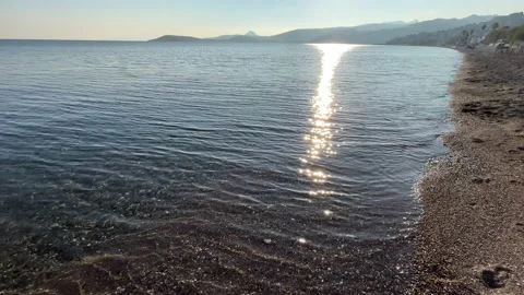 Bodrum Turkey Waves Lapping On A Beach At Sunset Stock Footage 235375034