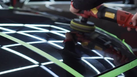 Body of black machine is carefully rubbed with polish, hood bends, becomes clean Stock Footage 115934811