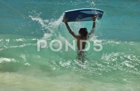 Body board surfer Stock Photos