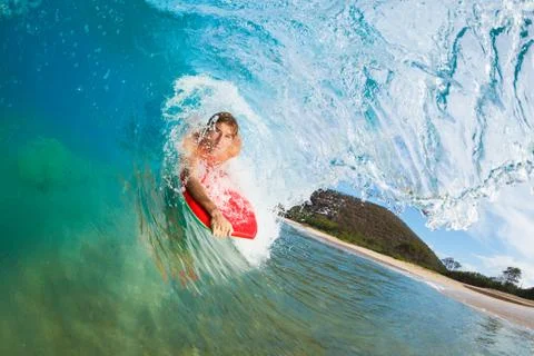 Body boarder surfing blue ocean wave Stock-Fotos