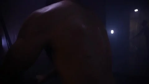 Body builder doing back exercise Stock Footage 247285297