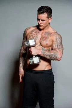 Body Builder With Free Weights Stock Photos
