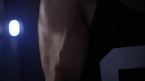 A body builder right arm bicep workout Stock Footage 247284431