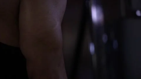A body builder right arm tricep workout Stock Footage 247284605