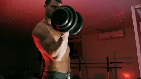 Body-builder shakes his arm muscles Stock Footage 75807332