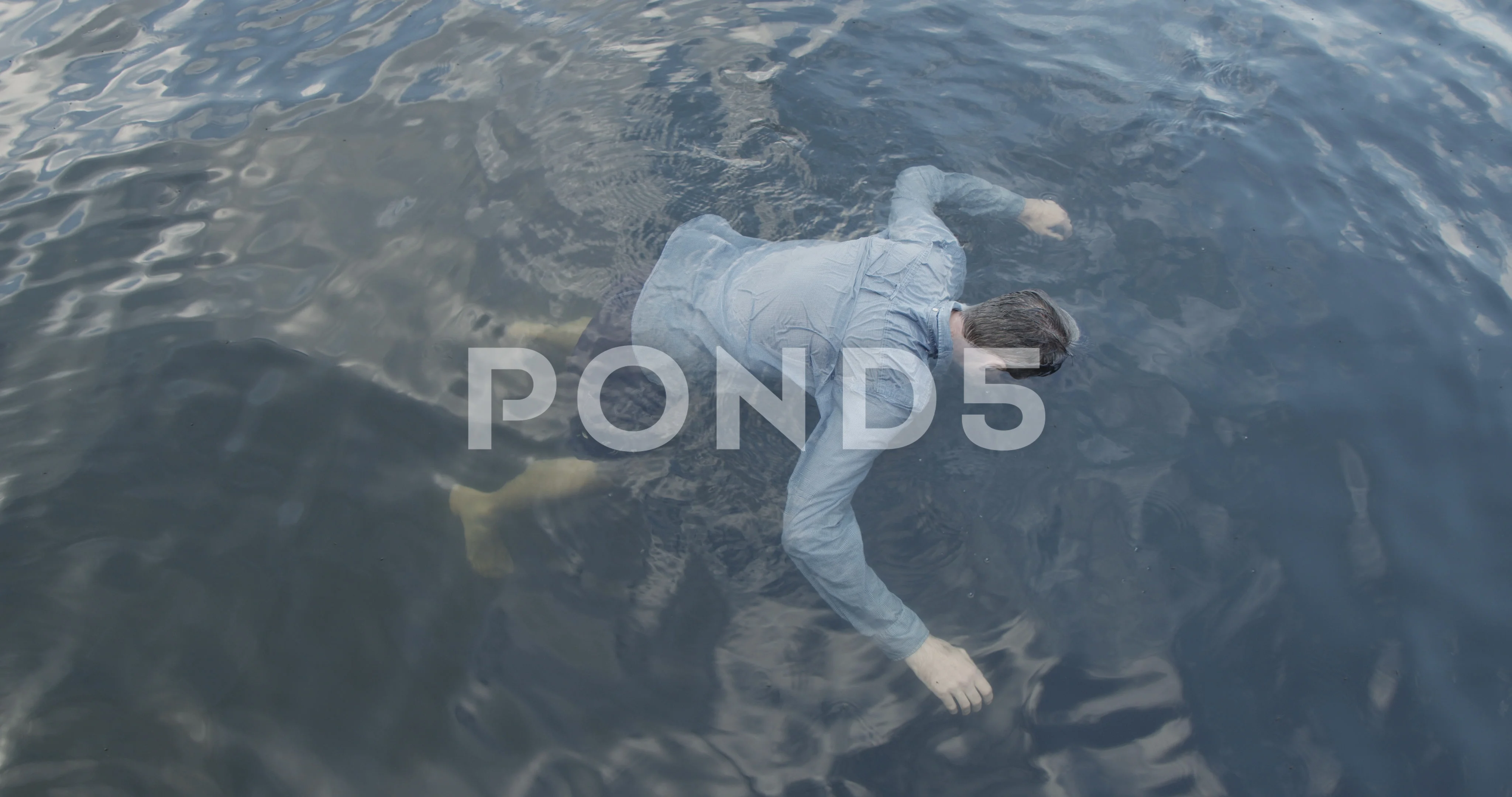 dead man floating in water