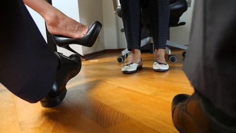 Body language. concept of business. feet of business people under the table Stock Footage