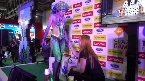 Body painting session during Milan Games Week 2017, Italy Stock Footage