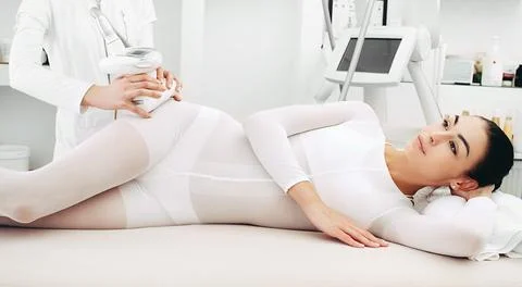 Body shaping using lpg massage. Woman improve shape of hips and body during m Foto stock