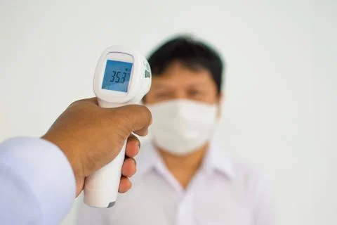 Body temperature checking, virus protection Stock Photos
