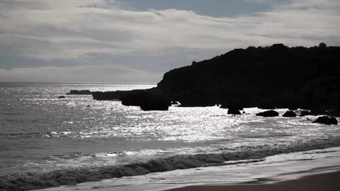 A body of water with a mountain in the background Stock Footage 155593651