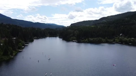 A body of water with a mountain in the background Video stock 156335956