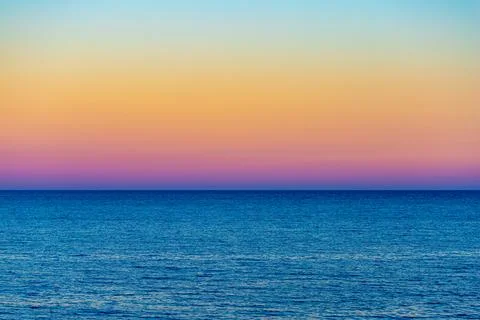 Body of Water under a Gradient Sky Stock Photos