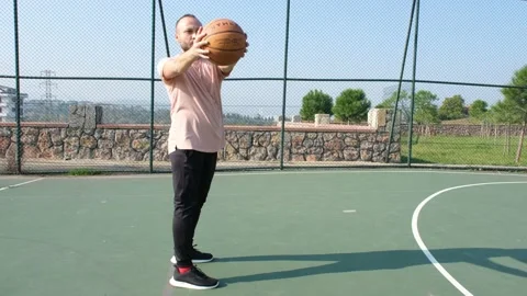 Body workout with basketball Stock Footage 169084103