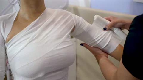 Body wrap procedure Stock Footage 149666214