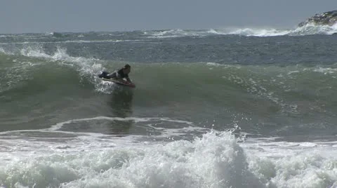 Bodyboarding in surf Stock Footage 11235693