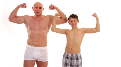 Bodybuilder and boy 2 Stock-Footage 24631239
