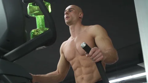 Bodybuilder athletic man workout muscles exercise Video stock 127544739