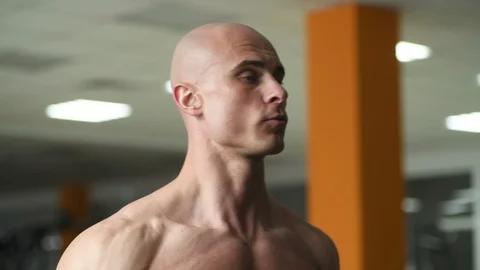 Bodybuilder athletic man workout muscles exercise Video stock 127545238