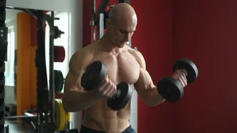 Bodybuilder athletic man workout muscles exercise Video stock 127545239