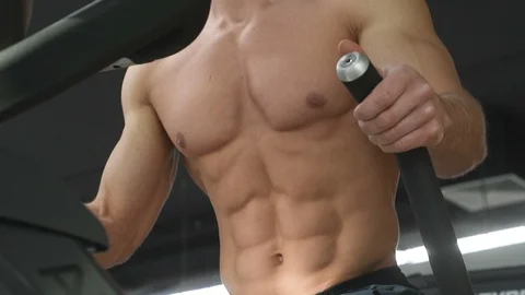 Bodybuilder athletic man workout muscles exercise in gym Vídeos de archivo 127545355