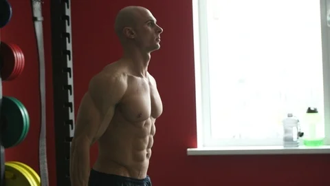 Bodybuilder athletic man workout muscles exercise Video stock 127545369