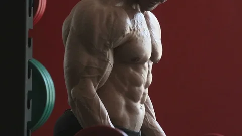 Bodybuilder athletic man workout muscles exercise Video stock 127873356