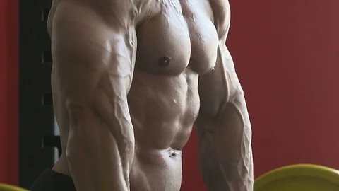 Bodybuilder athletic man workout muscles exercise Video stock 127873435