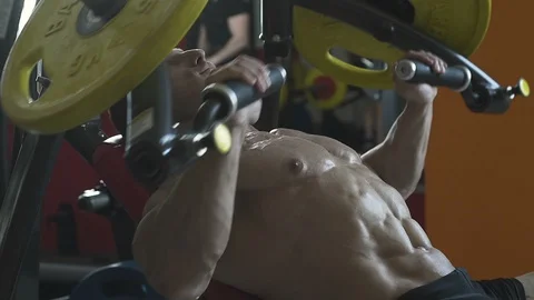 Bodybuilder athletic man workout muscles exercise Video stock 127873532