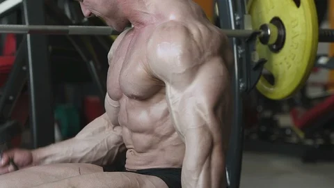 Bodybuilder athletic man workout muscles exercise Video stock 127873536