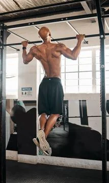 Bodybuilder, back exercise and man for pull ups, fitness or workout for strength Stock Photos