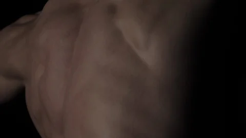 Bodybuilder on black background Video stock 128346345