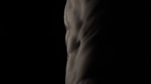 Bodybuilder on black background Video stock 128346433