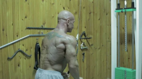 The bodybuilder do exercises for a triceps in the gym Stock Footage 57995366