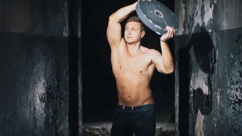 The bodybuilder does exercises for a back Stock Footage 88626888