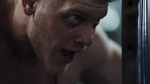 Bodybuilder doing exercise in the gym Stock Footage 130752536